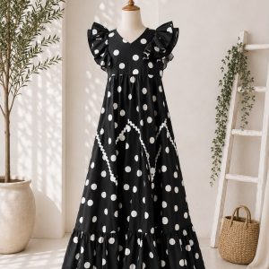 Traje negro lunar blanco